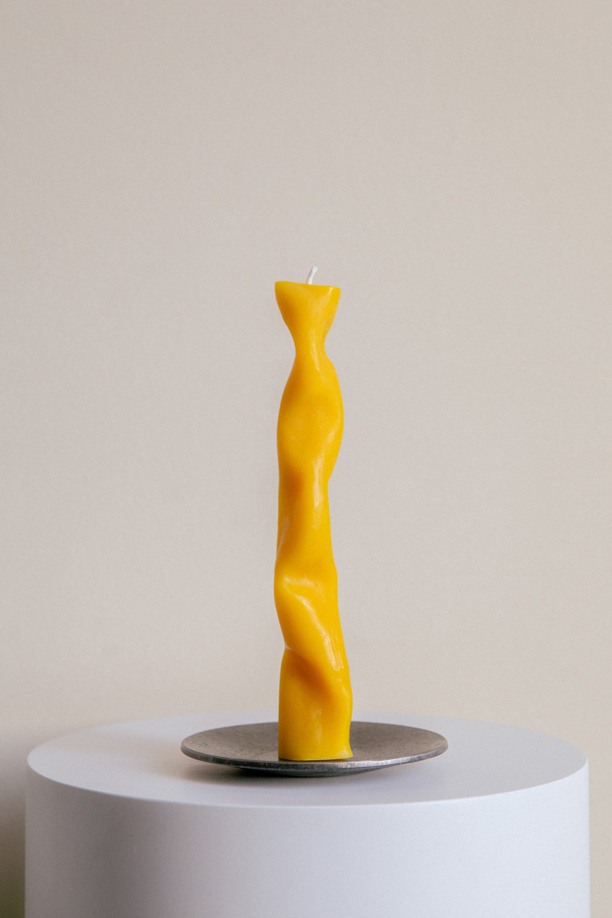 Handcrafted Iron Candle Holder with a Thorn in Silver-Grey-Black with a Wavy Sculptural Candle Made from Yellow Beeswax