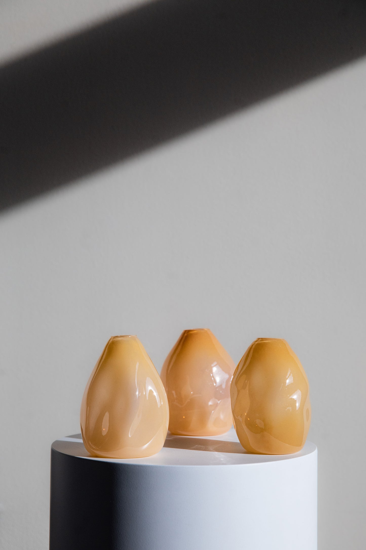 Three Small Wavy Glass Vases in Opaque Gold-Beige Made by a Glassblower